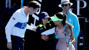 Ball girl collapses in Australian Open heat as players rush to help