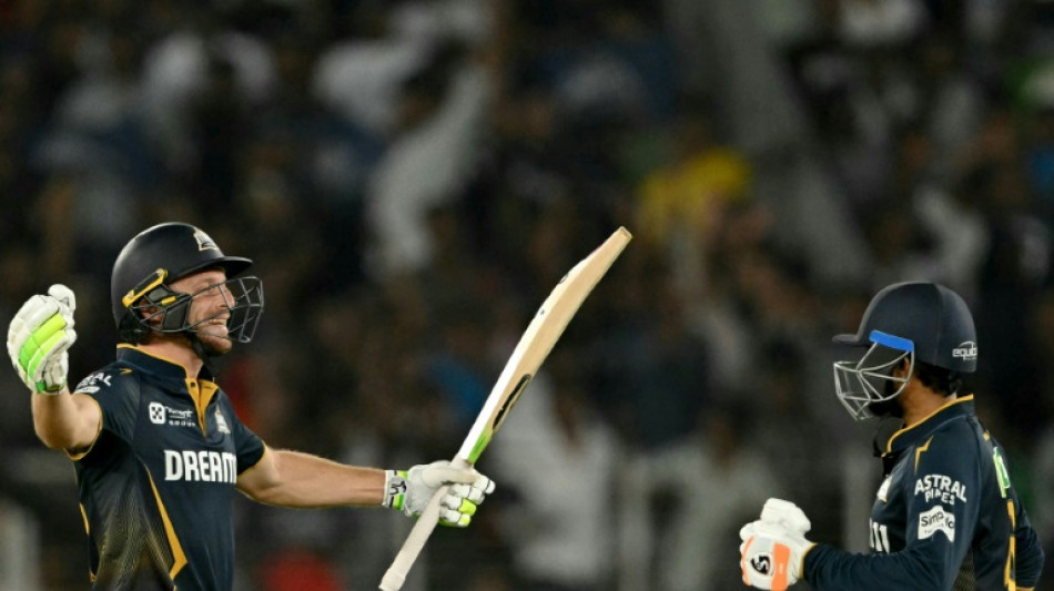 Buttler fires Gujarat to top of IPL table in intense heat