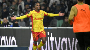 Lens move four points clear of PSG at top of Ligue 1