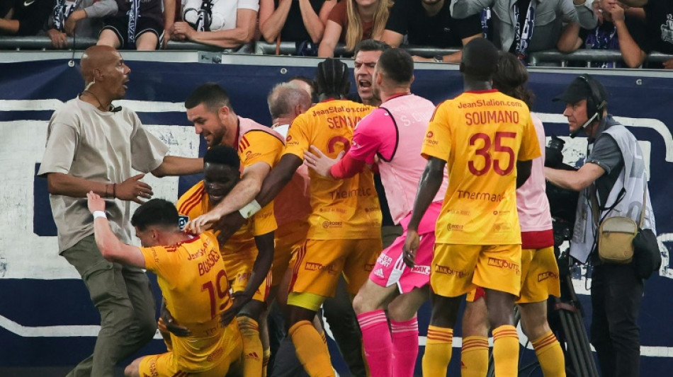 Four Bordeaux fans arrested after player assault stops French game