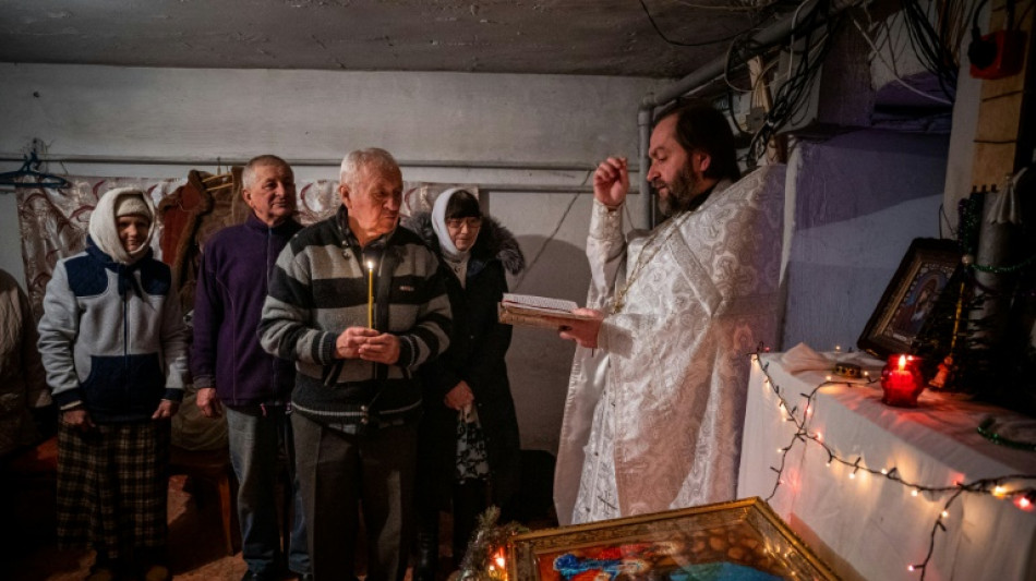Dans l'est de l'Ukraine, un No&euml;l dans la cave sous les bombardements
