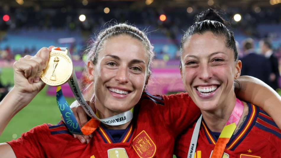 Spanish football boss apologises for kissing World Cup star 