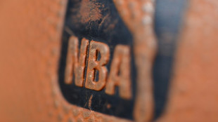 NBA adopts flopping penalty, expands coach's challenges