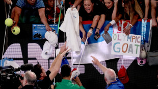 Open d'Australie: Djokovic atteint la centaine, Swiatek bataille