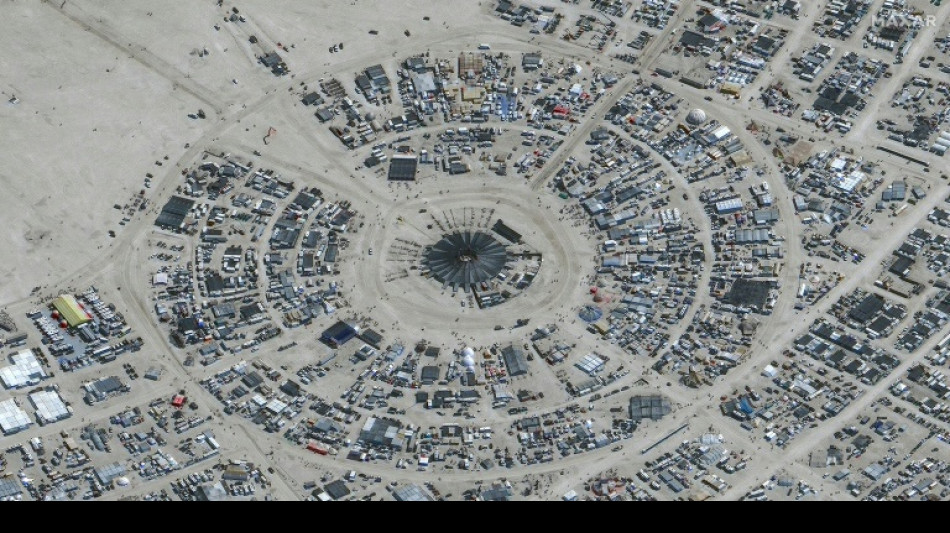 Thousands stuck in deep mud at Burning Man festival