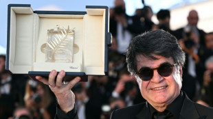 Iranian filmmaker Panahi urges 'freedom' as he wins Cannes top prize 