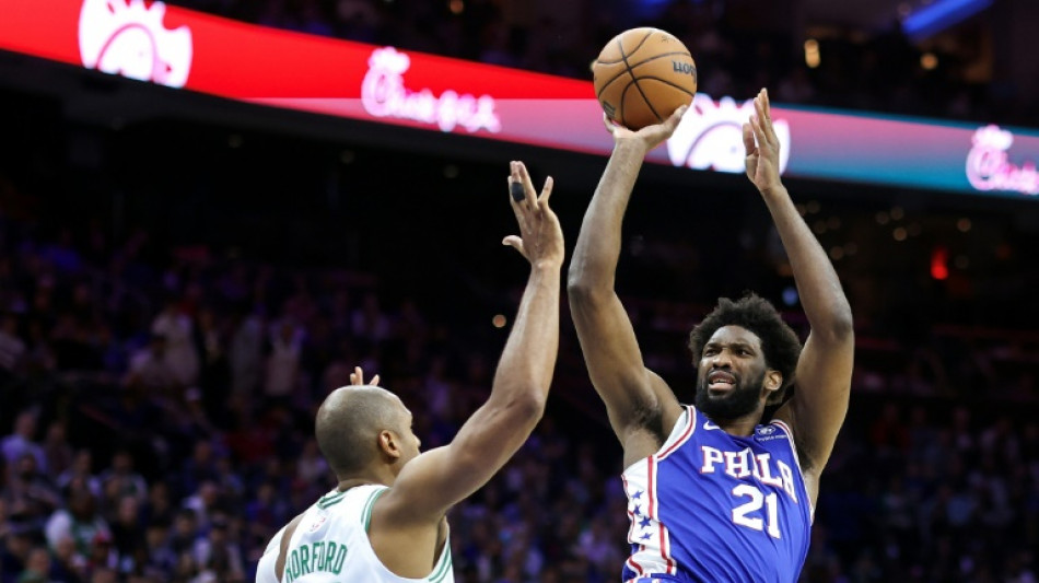 Embiid scores 52 as Sixers hold off Celtics, Bucks on brink