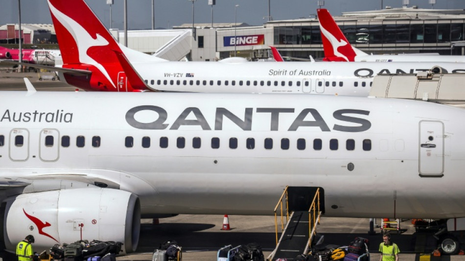 Qantas says profits slump as fuel costs surge