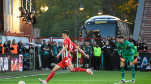 Union stun Dortmund and stay top as Bayern thrash Freiburg