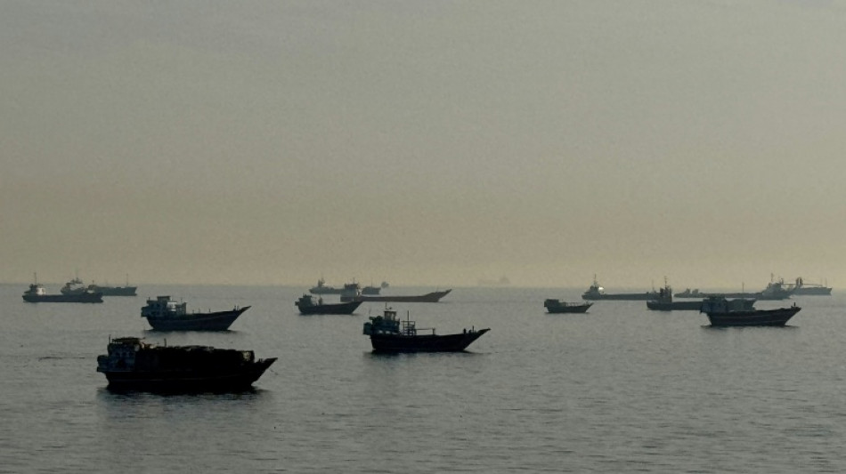 Oil edges back up, shares steady after US-Iran talks postponed