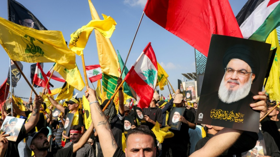 Hezbollah says it refuses to be disarmed one year after leader's killing