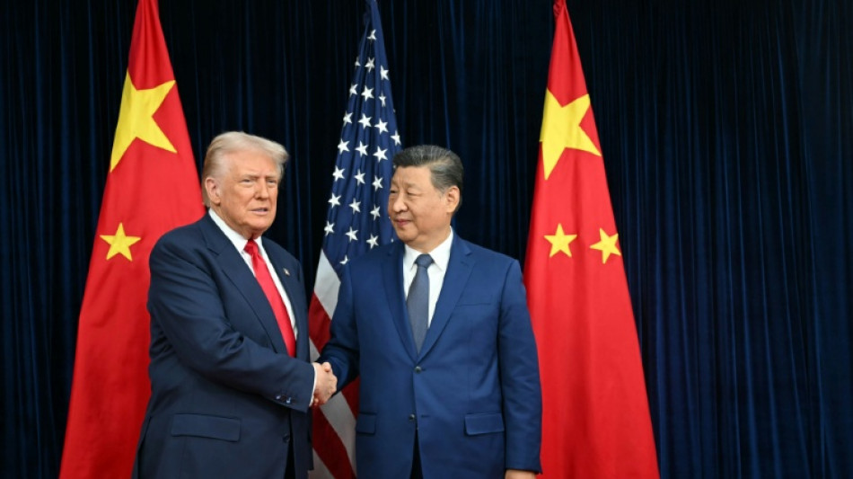 Stocks slide as investors digest Trump-Xi talks, earnings