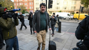 UK court clears comedy writer of damaging transgender activist's phone