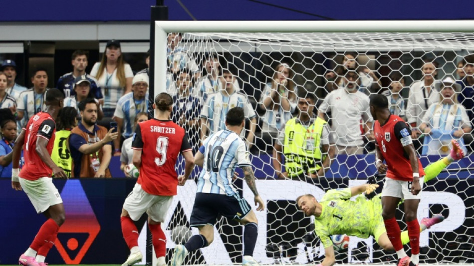 Messi sets World Cup scoring record as Argentina down Austria