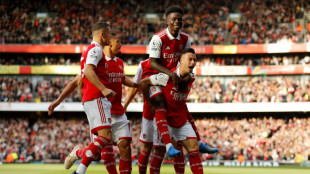 Arsenal beat Liverpool to go top, Ronaldo hits 700 in Man Utd win
