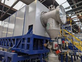 A large machine in a factory AI-generated content may be incorrect.