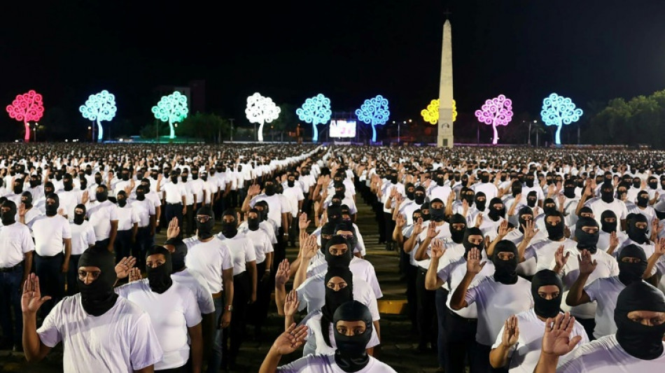Accused of repression, Nicaragua's Ortega swears in hooded 'volunteer' force