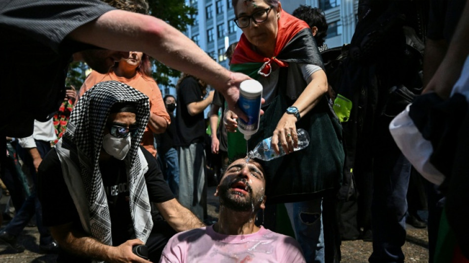 Sydney police pepper spray protesters during rallies against Israeli president's visit