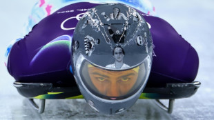 Olympic chiefs let Ukrainian athlete wear black armband at Olympics after helmet ban