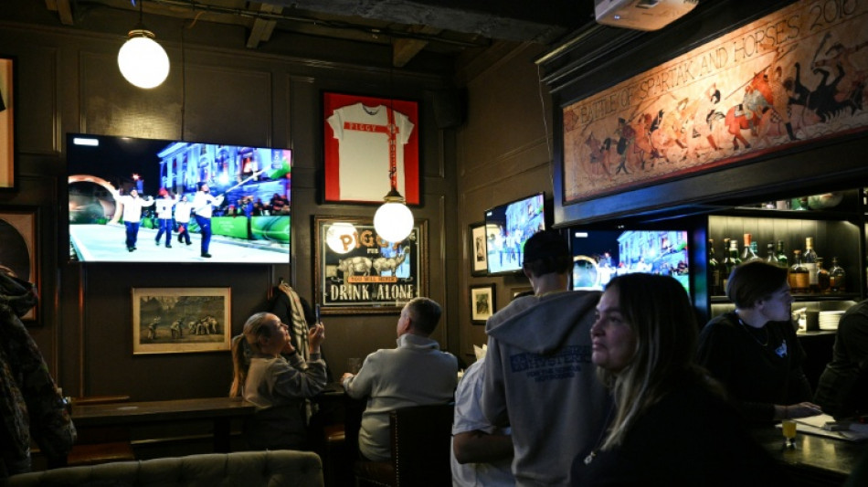 Em um pub de Moscou, Jogos de Inverno fazem clientes esquecer a pol&iacute;tica