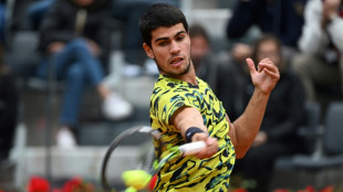 Alcaraz marks return to world number one with victory on Rome debut