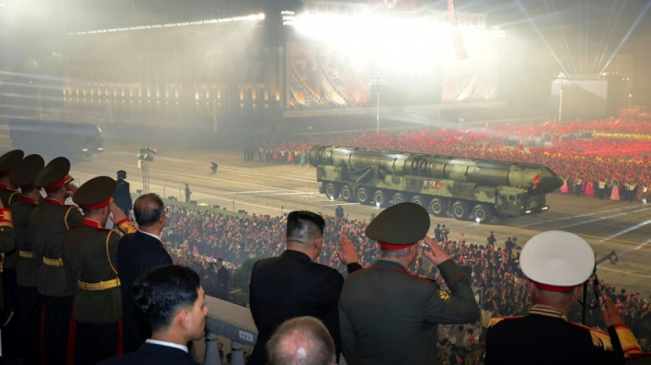 Kim oversees N. Korea military parade showcasing new drones, ICBMs