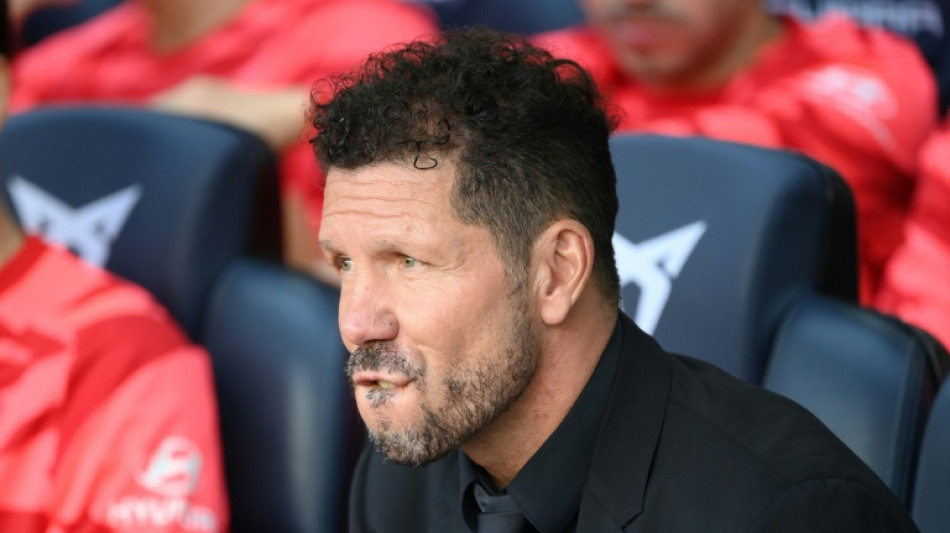 Wass injury blow for Atletico on debut